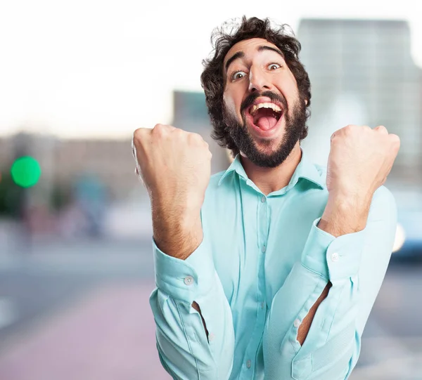 Mutlu genç adam işareti kutluyor — Stok fotoğraf