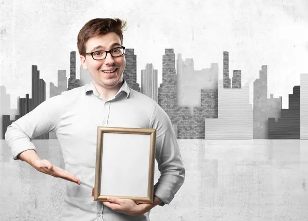 Happy young man with retro frame — Stock Photo, Image