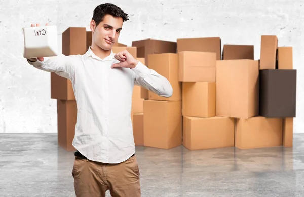 Proud young man with control key — Stock Photo, Image