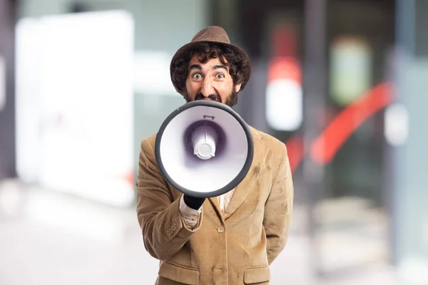 angry young man with megaphone