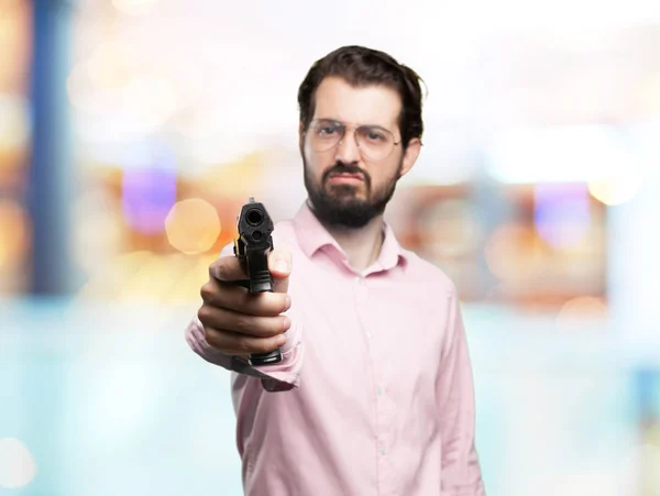 Joven enojado con pistola pop — Foto de Stock