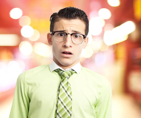 Worried businessman in scared pose — Stock Photo, Image