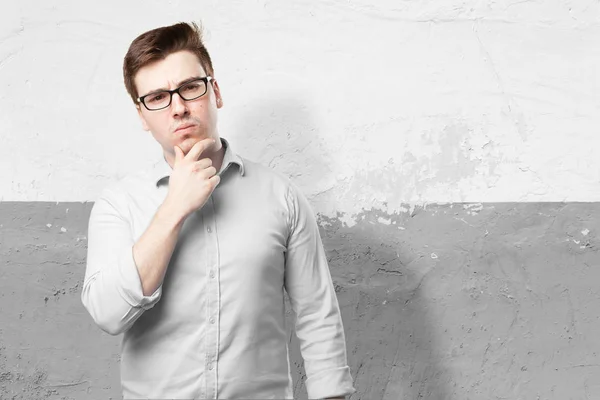 Confused young man thinking — Stock Photo, Image