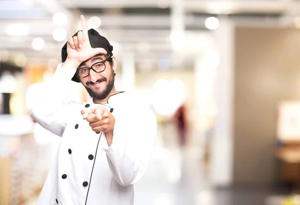 Orgulloso cocinero con signo de perdedor — Foto de Stock