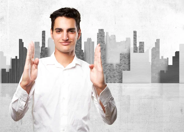 Happy young man showing gesture — Stock Photo, Image