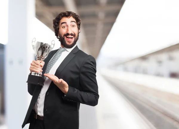 Homem de negócios feliz com copo esporte — Fotografia de Stock