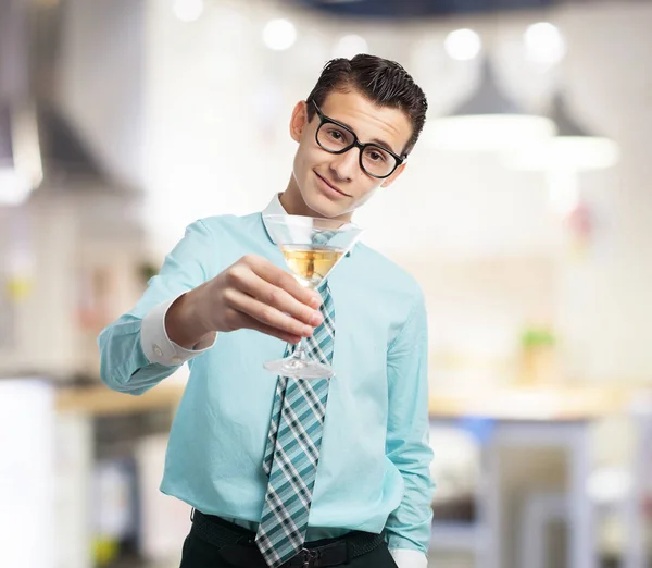 Happy businessman with alcoholic drink — Stock Photo, Image