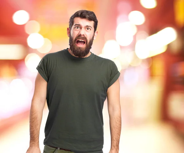 Angry young man shouting — Stock Photo, Image