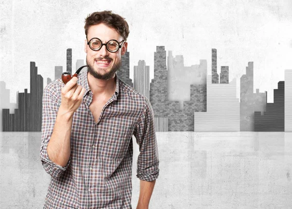 Crazy young man with pipe — Stock Photo, Image