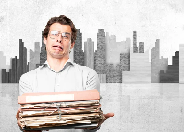 Boring young man with files — Stock Photo, Image