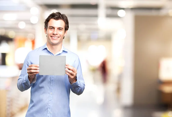 Felice uomo d'affari con carta grigia — Foto Stock