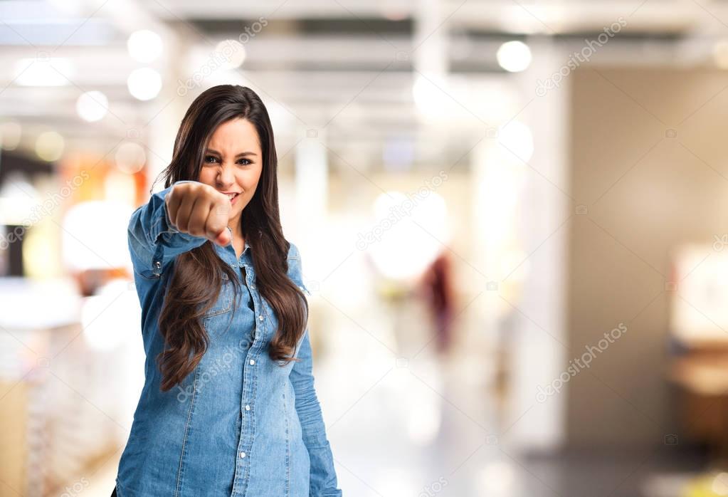 angry young woman with fist