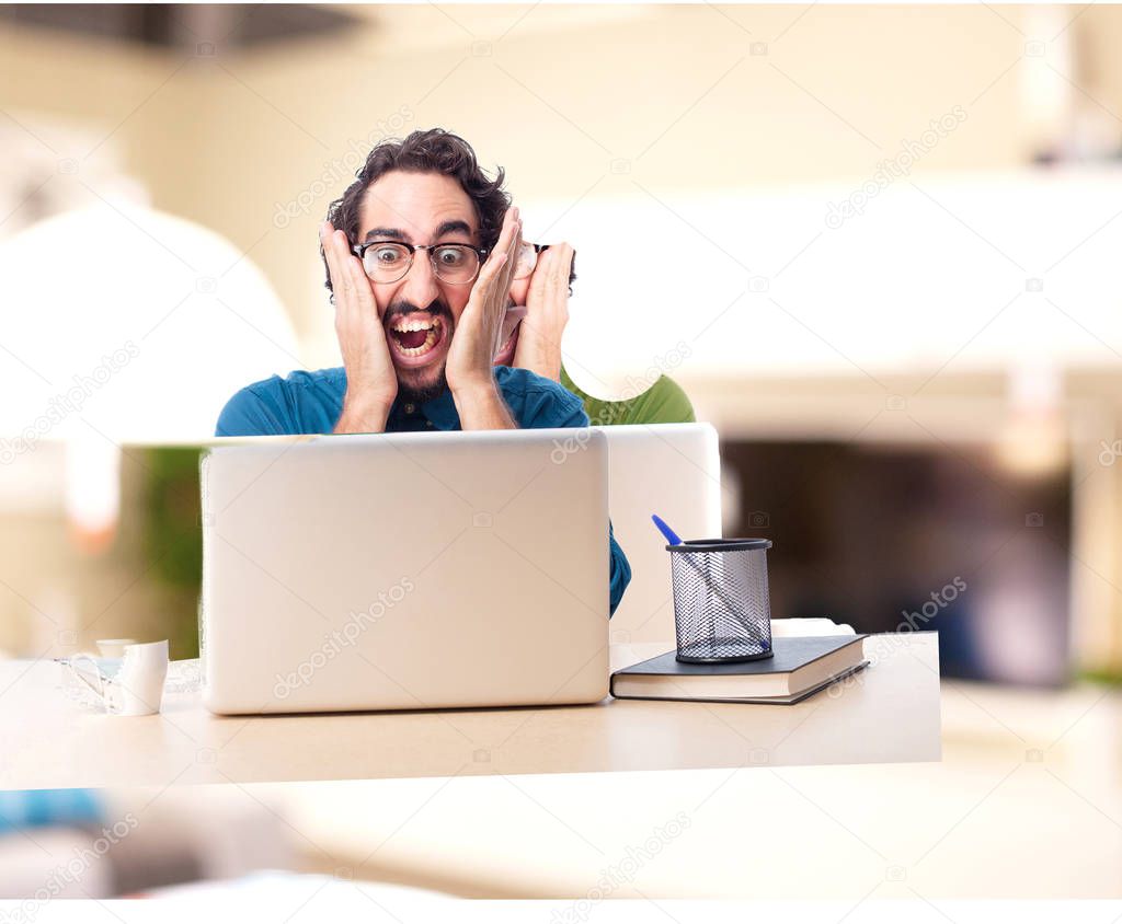 angry businessman with laptop