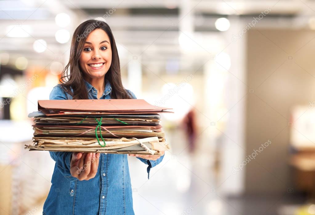 happy young woman with files