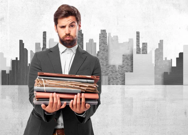 Boring businessman with files — Stock Photo, Image
