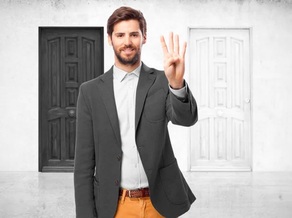 Happy businessman with number four sign — Stock Photo, Image