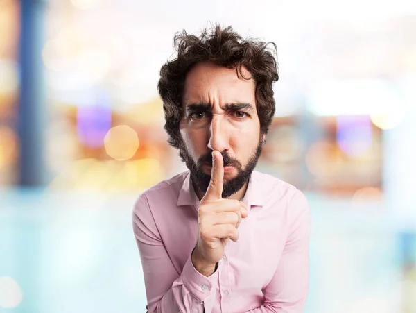 Angry young man with silence sign — Stock Photo, Image