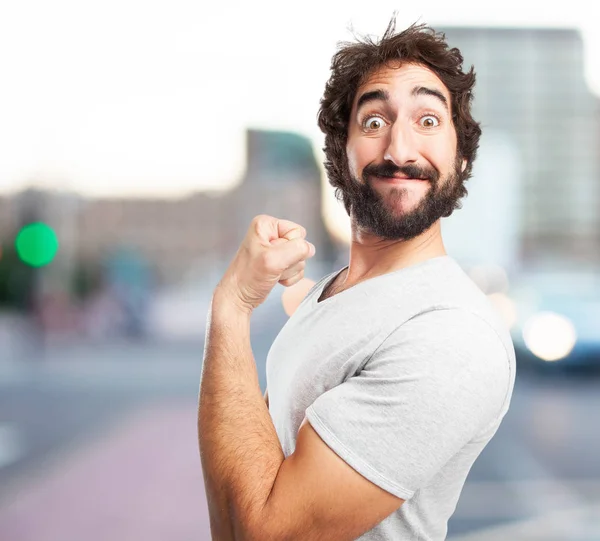 Gelukkig jongeman in sterke pose — Stockfoto