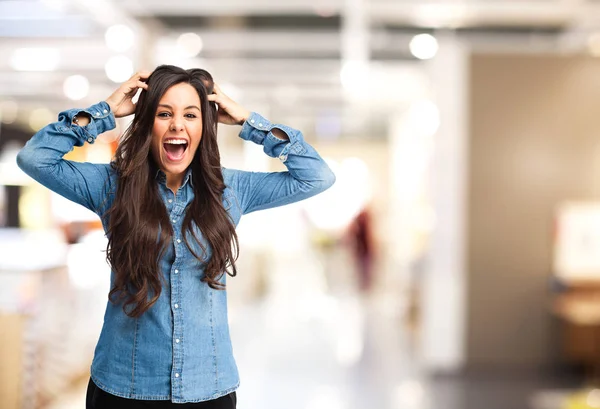 Mujer joven sorprendida en pose loca —  Fotos de Stock