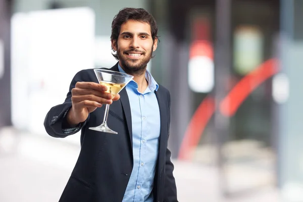 Hombre de negocios feliz con bebida alcohólica —  Fotos de Stock