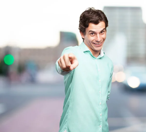 Happy businessman pointing front — Stock Photo, Image