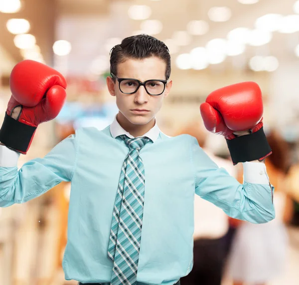 Happy businessman in boxing gloves — Stock Photo, Image