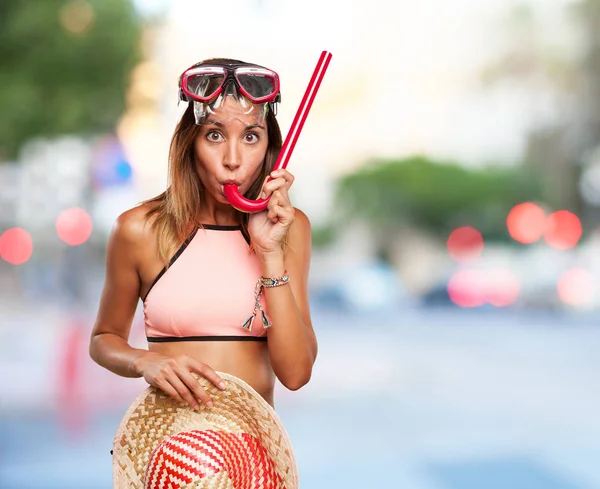 Happy young woman with snorkel goggles — Stock Photo, Image