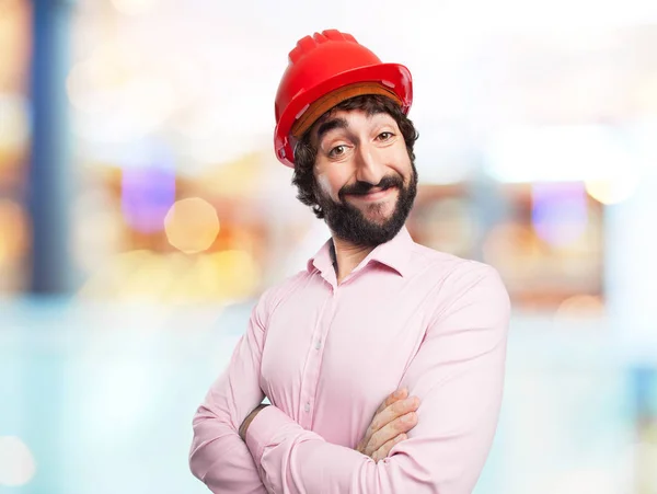 Jovem orgulhoso com capacete trabalhador — Fotografia de Stock