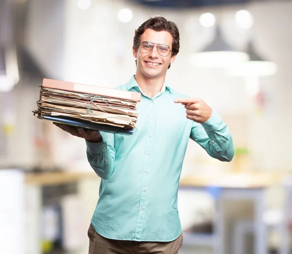 Happy young man with files — Stock Photo, Image