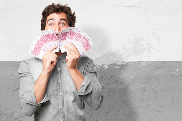 Happy man with money in her hands — Stock Photo, Image