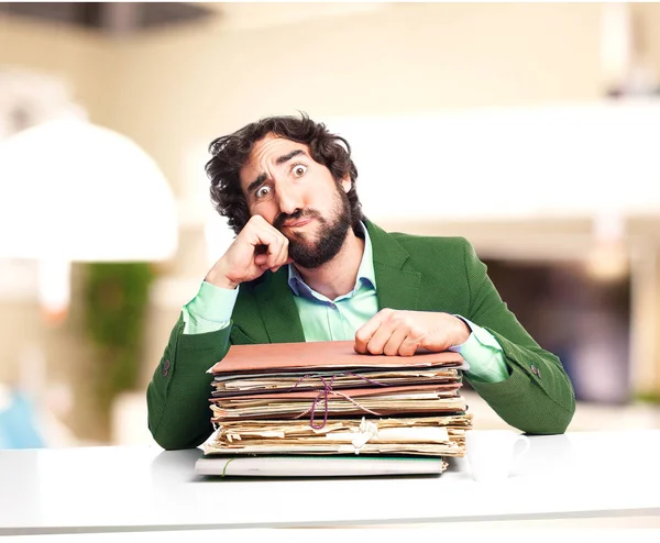 Stressed businessman with files — Stock Photo, Image