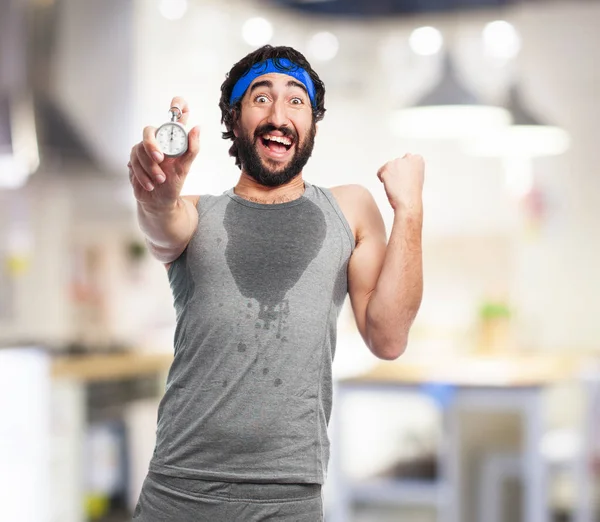 Tired sport man with stopwatch — Stock Photo, Image