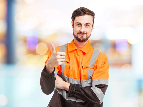 Hombre trabajador feliz con signo de bien — Foto de Stock