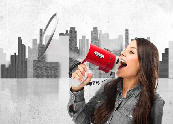 Happy young woman with megaphone — Stock Photo, Image