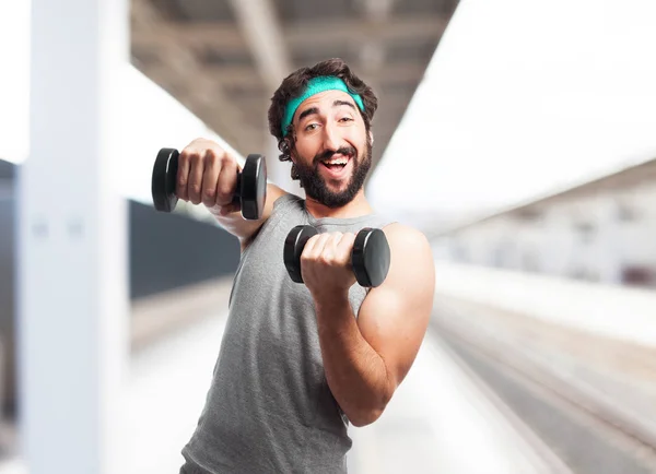 happy sport man with dumbbell