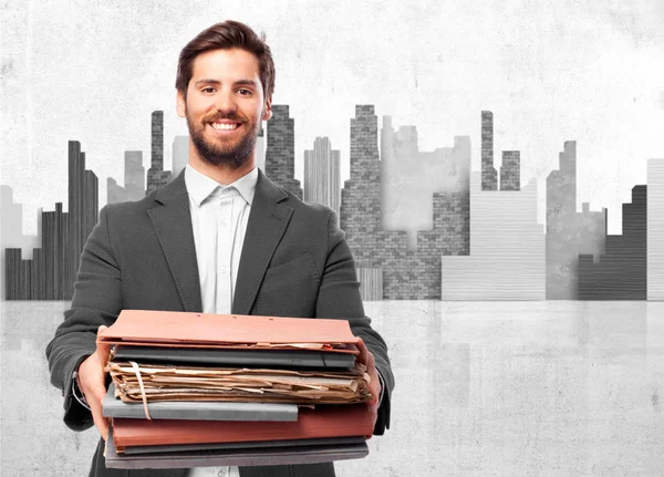 Happy businessman with files — Stock Photo, Image