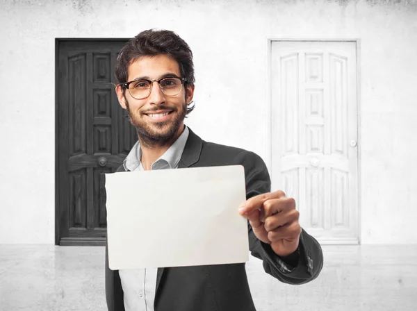 Happy businessman with placard — Stock Photo, Image