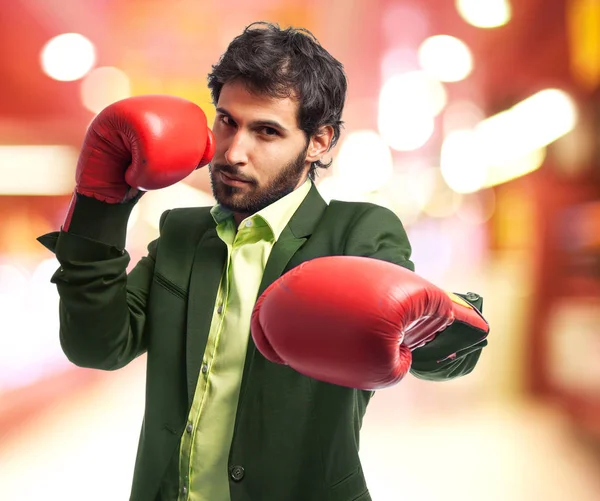 Hombre de negocios enojado en guantes de boxeo — Foto de Stock