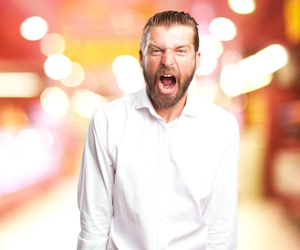 Angry young man shouting — Stock Photo, Image