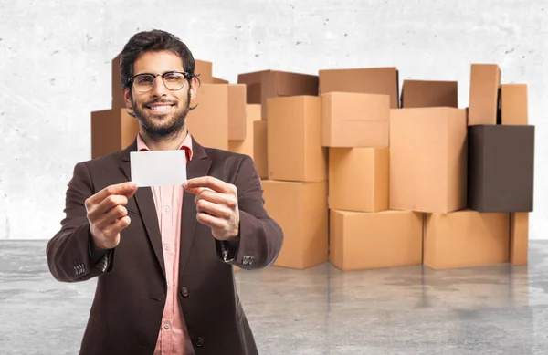 Happy businessman with visit card — Stock Photo, Image