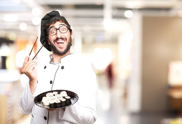 happy cook man with sushi