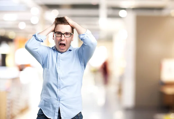 Angry young man met verliezer teken — Stockfoto