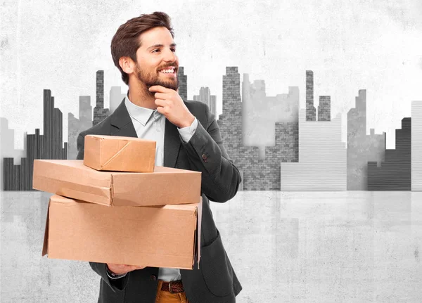 Hombre de negocios feliz con cajas —  Fotos de Stock