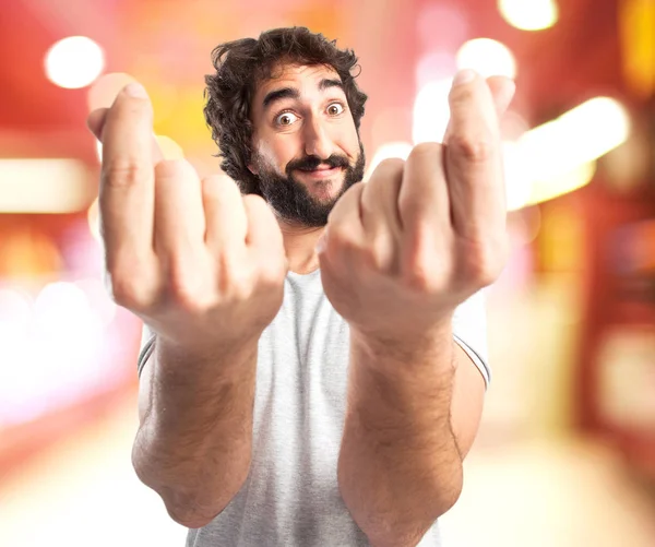 Gelukkig jongeman met rekeningen teken — Stockfoto