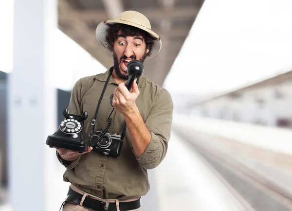 Crazy explorer man with telephone — Stock Photo, Image