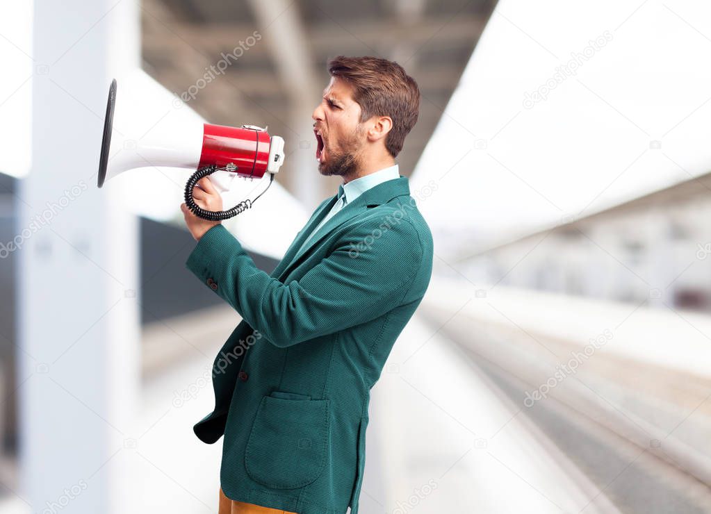 shouting businessman with megaphone