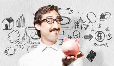 bir kumbara ile genç serin adam