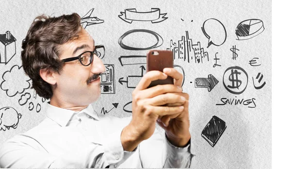 Joven hombre fresco con un teléfono móvil —  Fotos de Stock