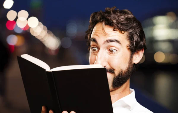 Young cool man with a book — Stock Photo, Image