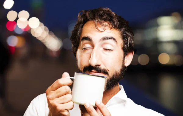 Leuke jongeman met een kopje koffie — Stockfoto